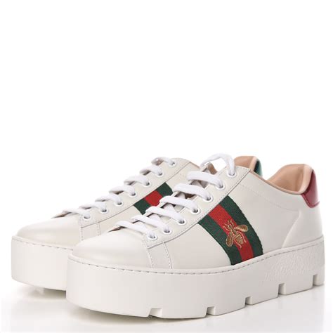 gucci ace embroidered shoes.